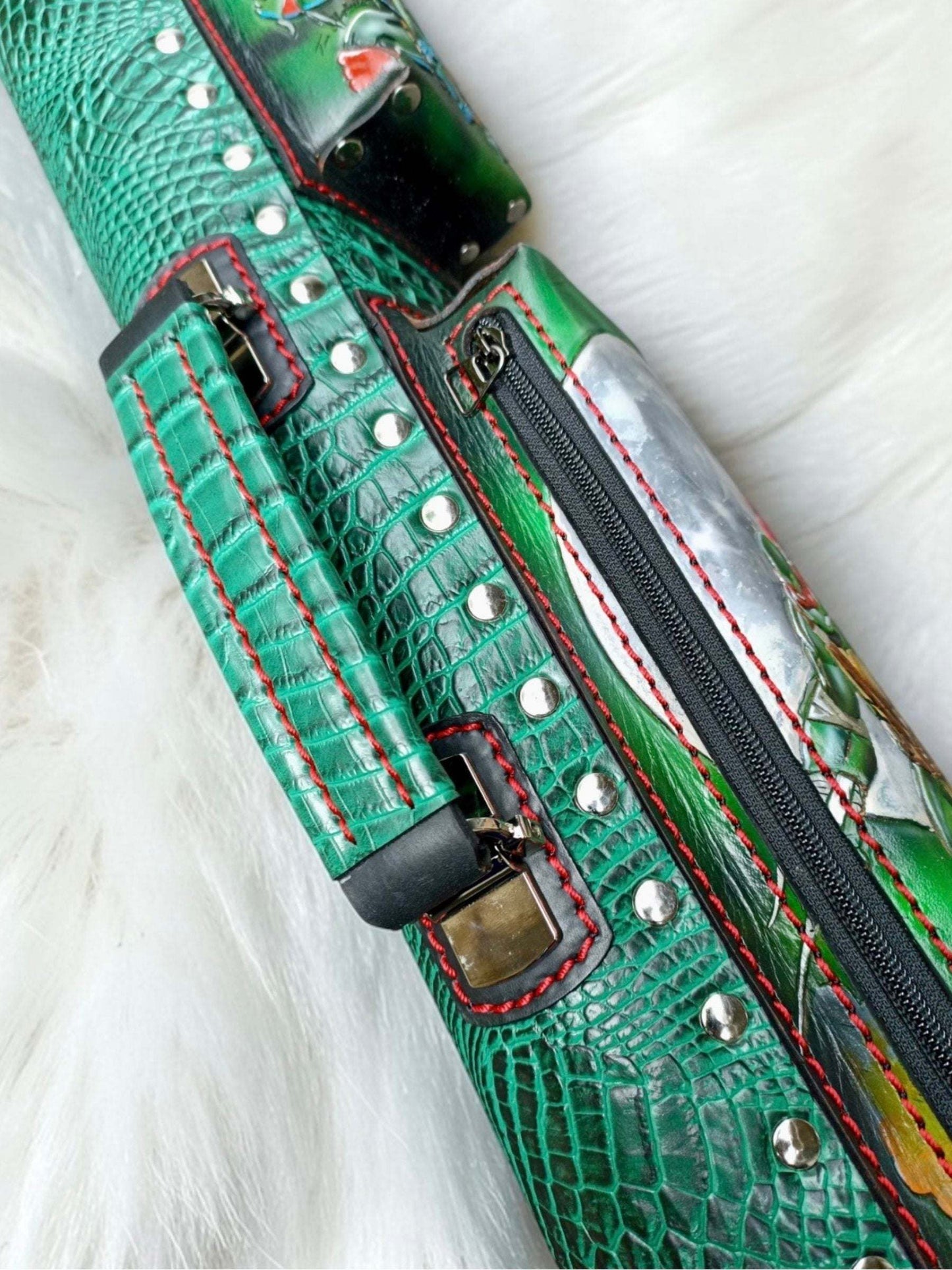 Close-up side detail of TMNT leather cue case with hand stitching, hardware, and textured leather