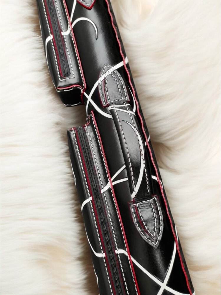 Side close-up of Tribal black leather cue case