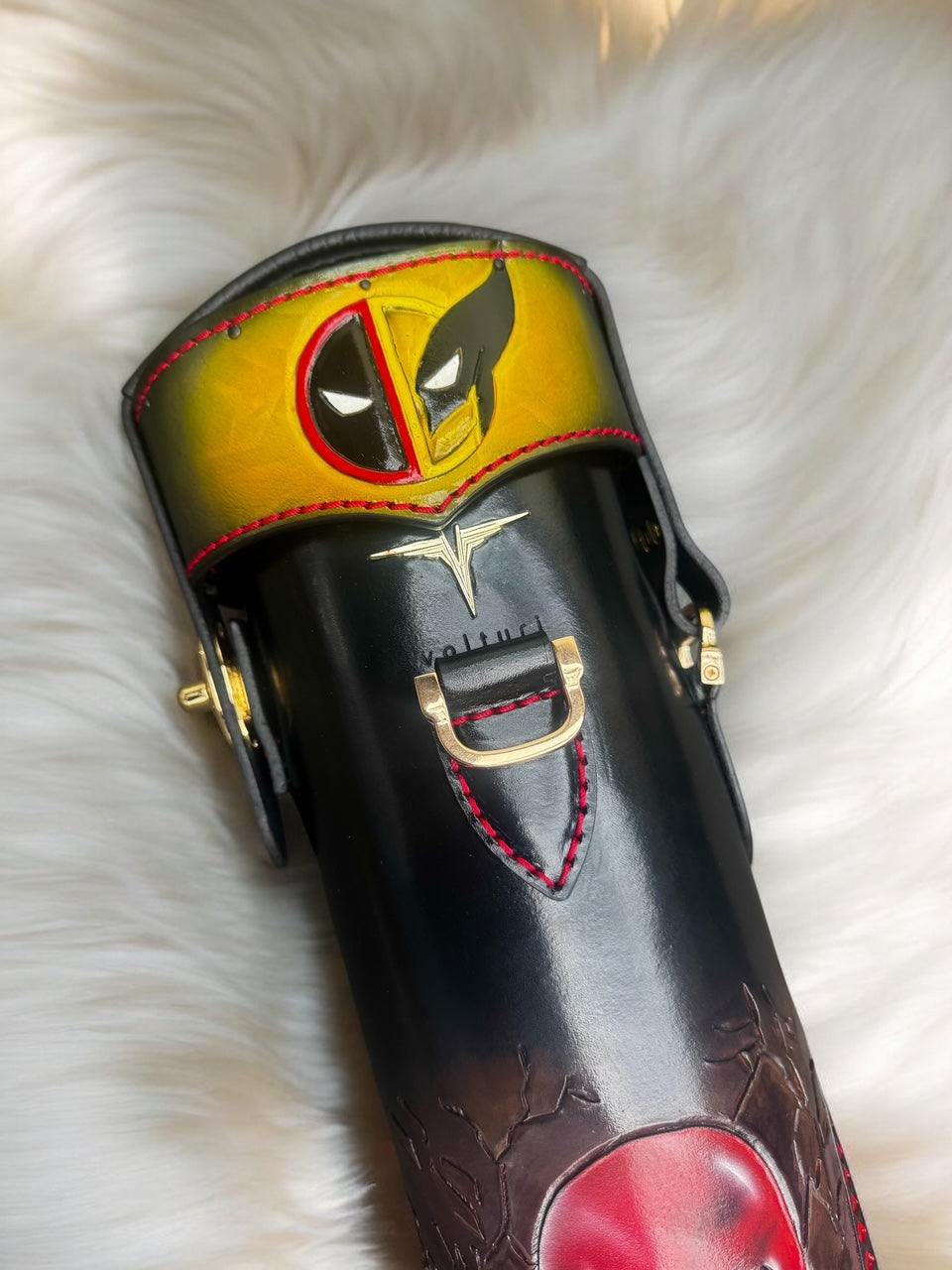 Top view of Wolverine Deadpool custom leather cue case with comic-inspired artwork