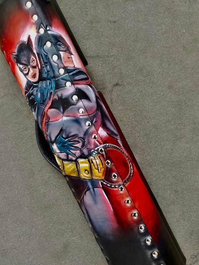 Close-up of Batman custom leather pool cue case with comic-inspired artwork and handmade finish