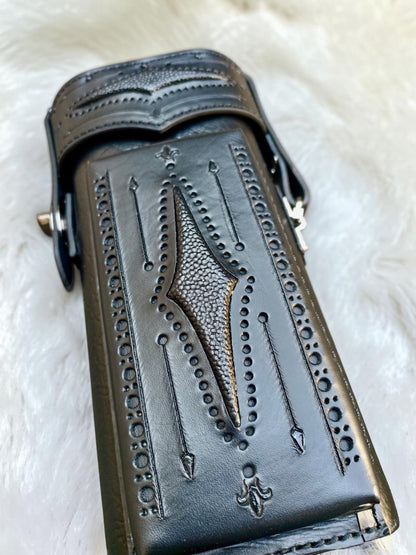 Close-up of hand-tooled black-on-black detailing on Brogue I Ghost leather pool cue case