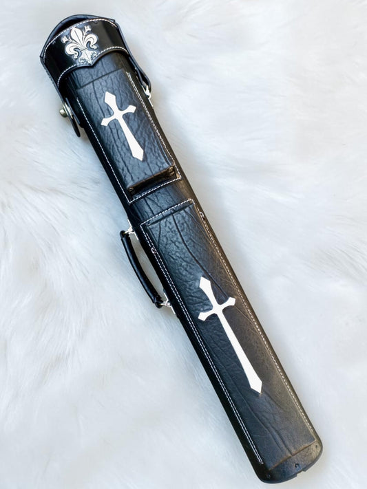 Front view of Crusade black leather cue case with white cross inlays, fleur-de-lis cap, and handmade finish