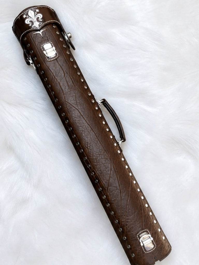 Back view of Crusade brown leather cue case with hand-carved fleur-de-lis detail on the top lid and handmade finish