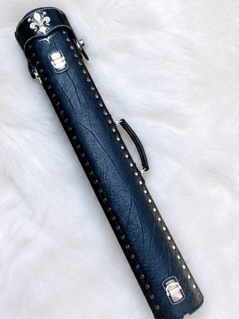 Back view of Crusade dark blue leather cue case with hand-carved fleur-de-lis detail on the top lid and handmade finish