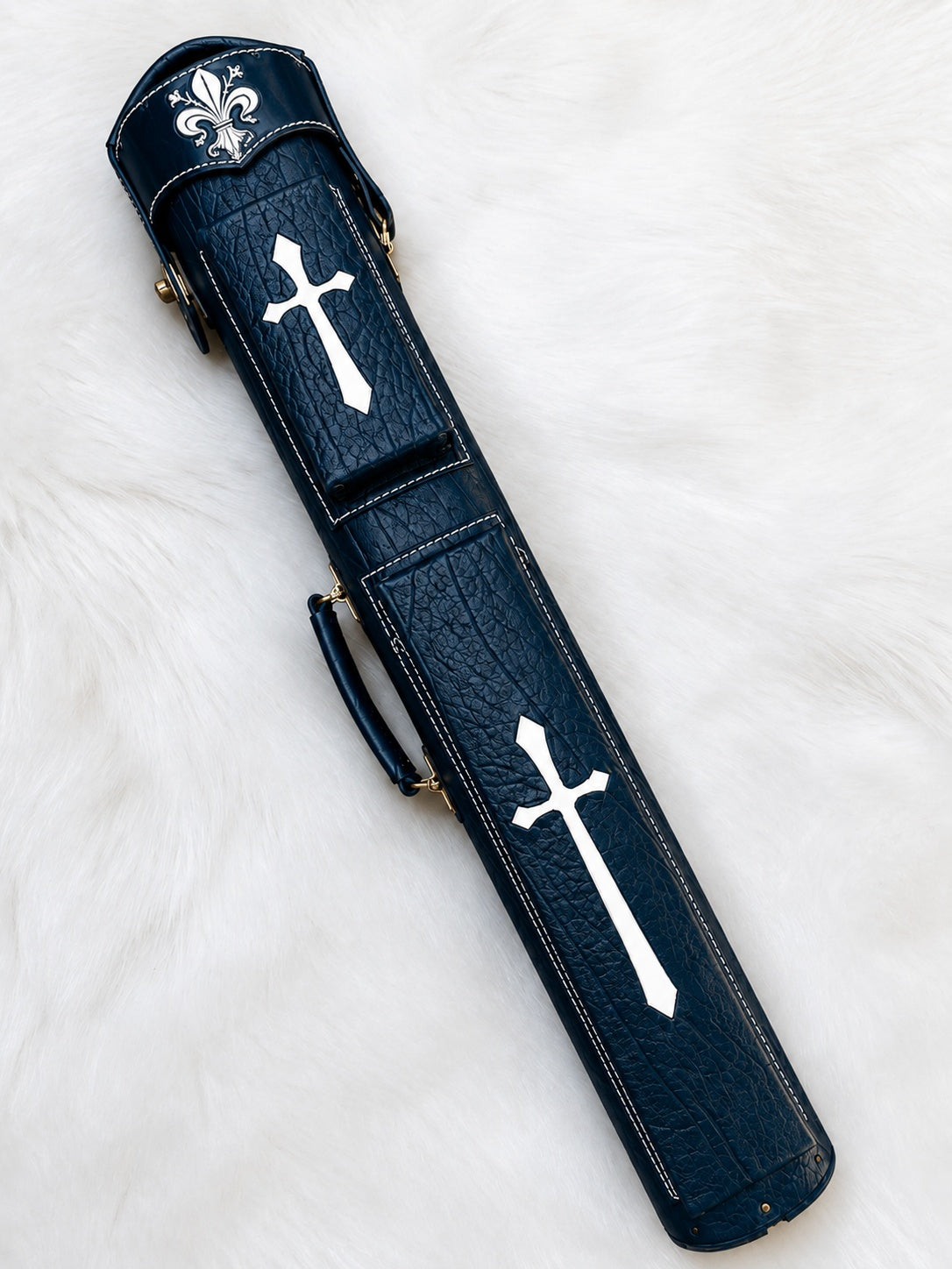 Front view of Crusade dark blue leather cue case with cross inlays, fleur-de-lis cap, and handcrafted finish