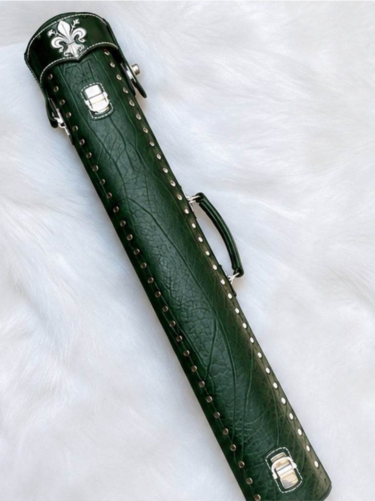 Back view of Crusade green leather cue case with hand-carved fleur-de-lis detail on the top lid and handmade finish
