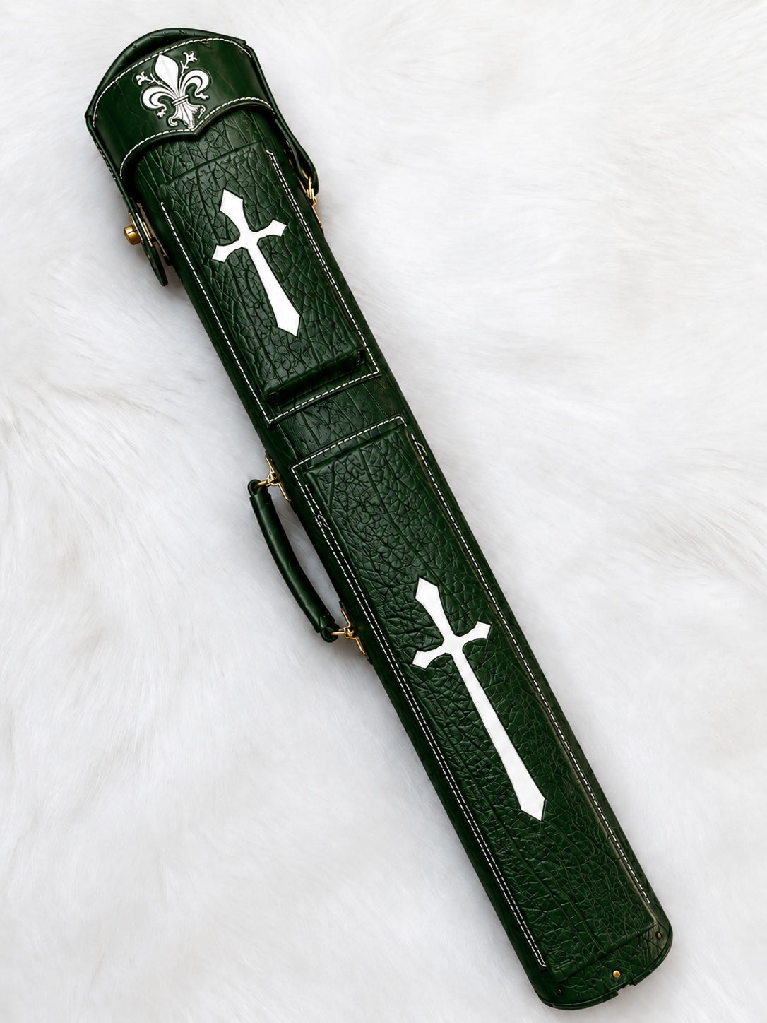 Front view of Crusade green leather cue case with cross inlays, fleur-de-lis detailing, and handmade finish