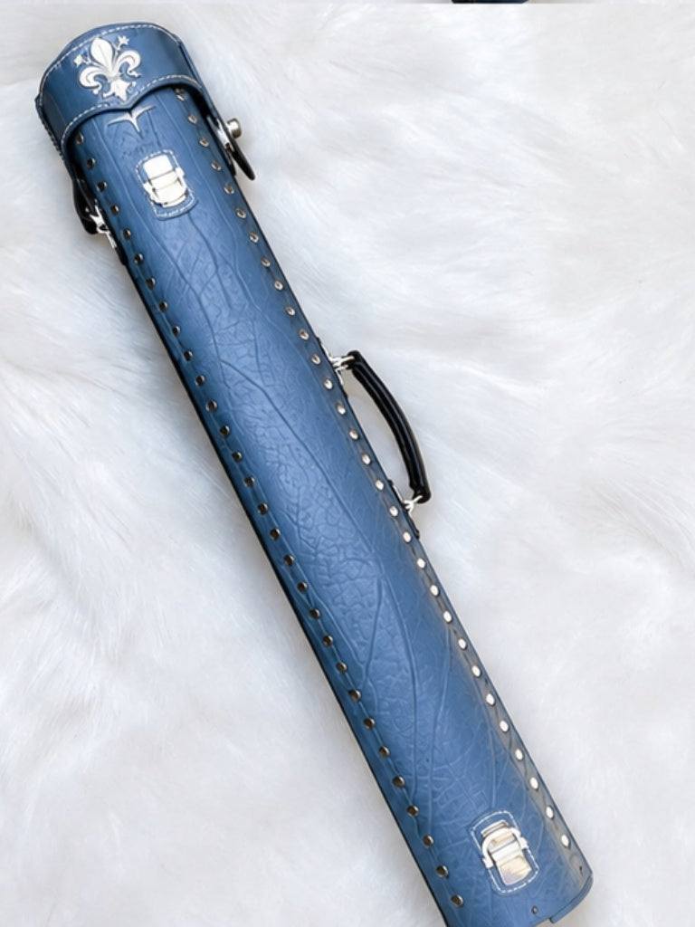 Back view of Crusade light blue leather cue case with hand-carved fleur-de-lis detail on the top lid and handmade finish