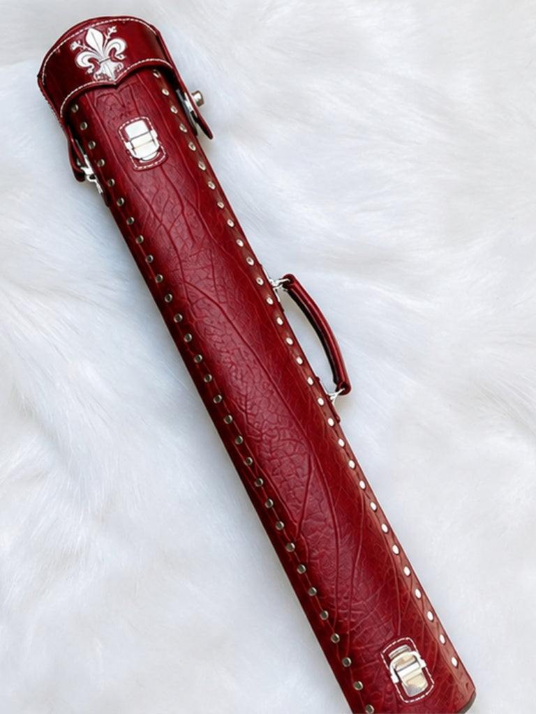 Back view of Crusade red leather cue case with hand-carved fleur-de-lis detail on the top lid and handmade finish