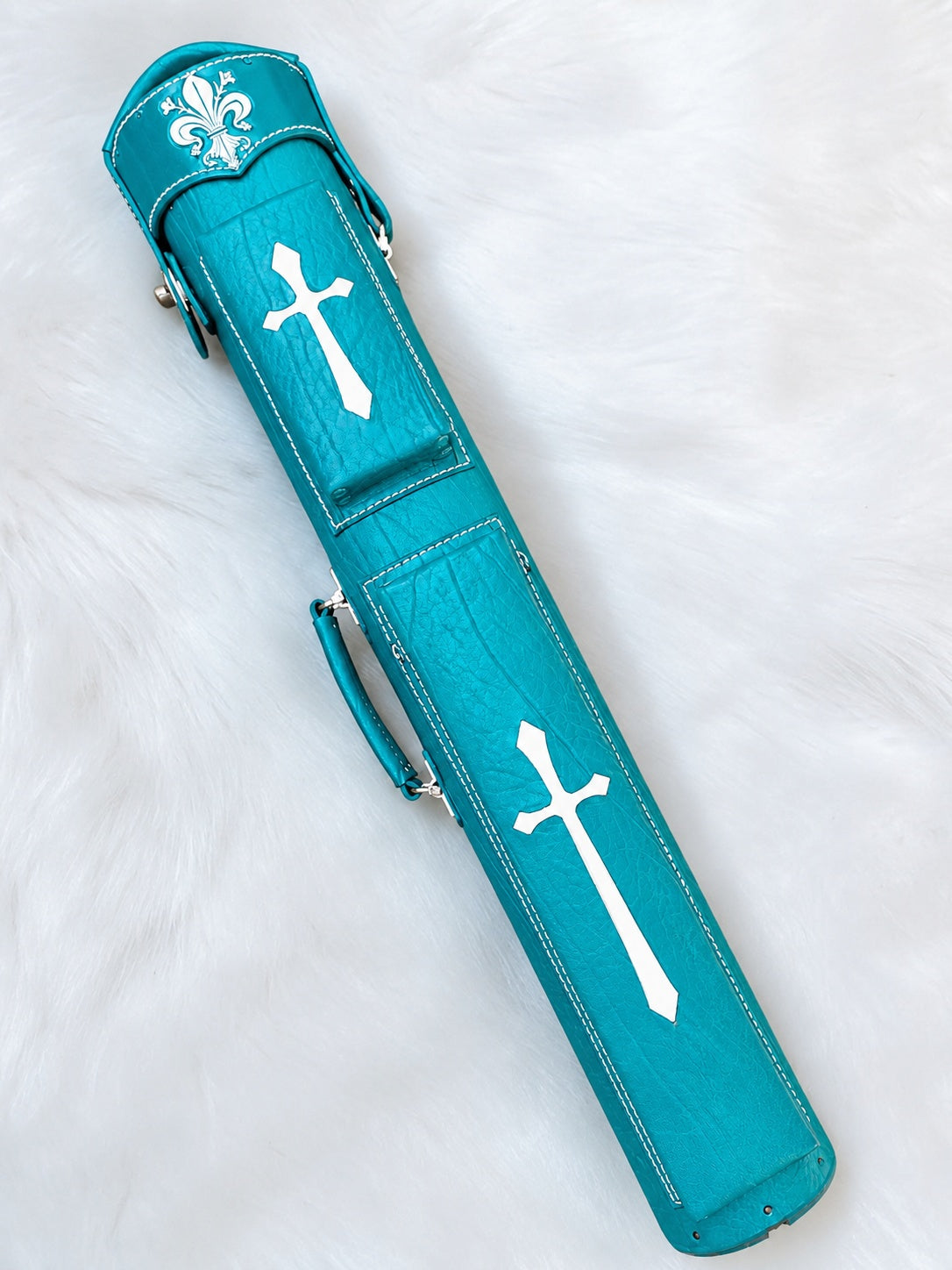 Front view of Crusade turquoise leather cue case with cross inlays, fleur-de-lis cap, and handmade finish