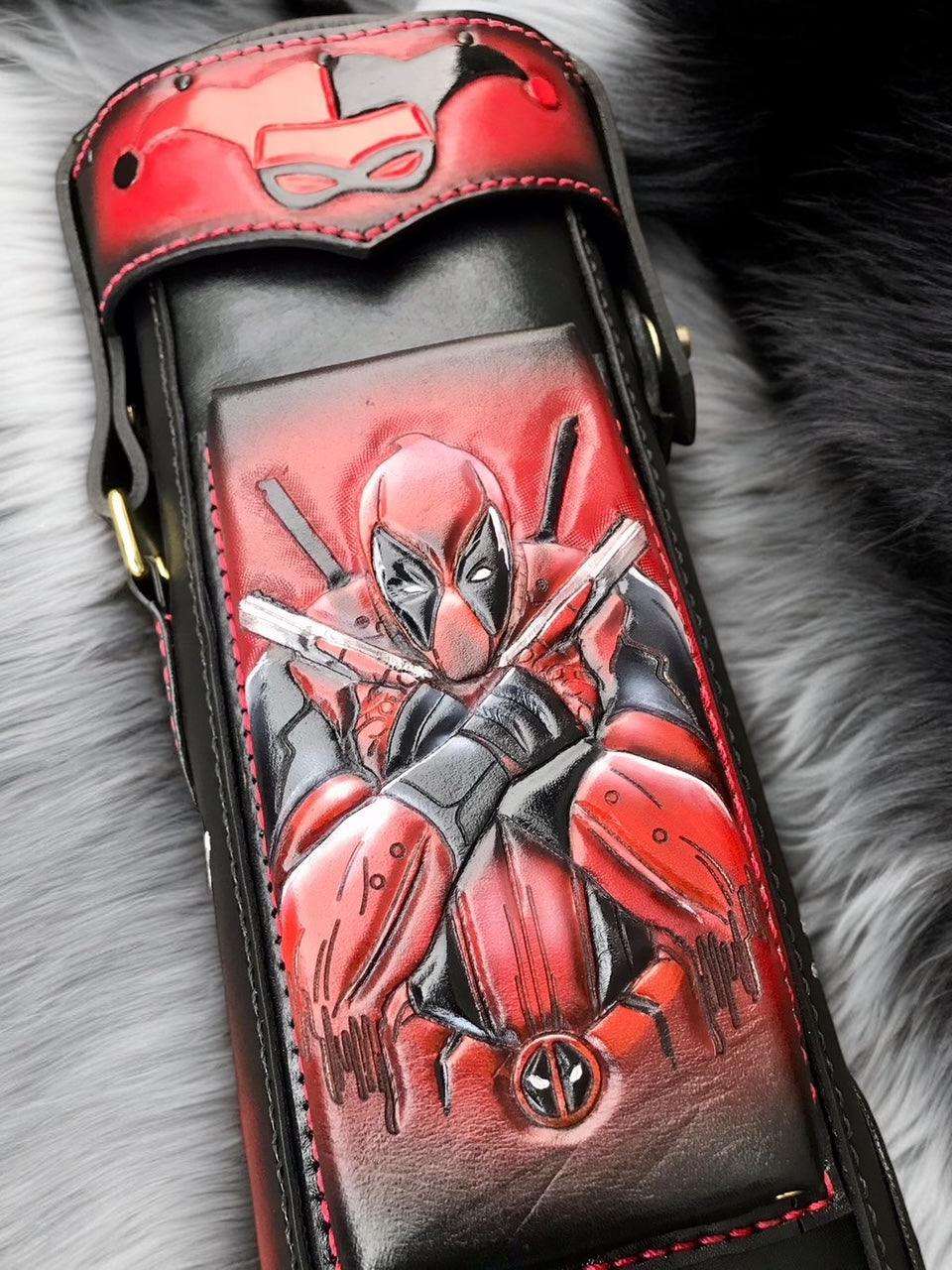 Front close-up of Joker, Harley Quinn and Deadpool custom pool cue case with comic-inspired artwork