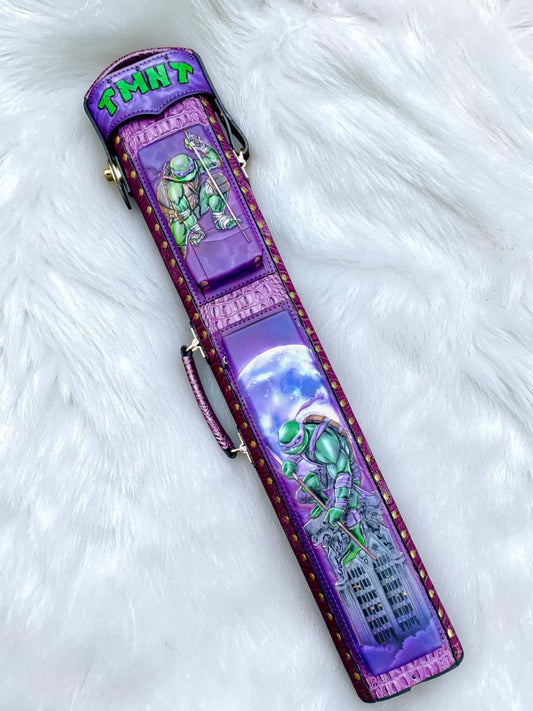 TMNT Donatello leather cue case front with hand-painted artwork and purple leather.