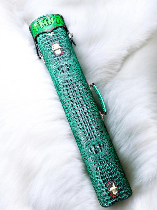 Back view of TMNT Ninja Turtle leather cue case with green panels, red mask accents, and handcrafted detailing