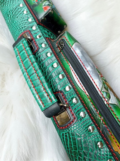 Close-up side detail of TMNT Ninja Turtle leather cue case with hand stitching, hardware, and textured leather